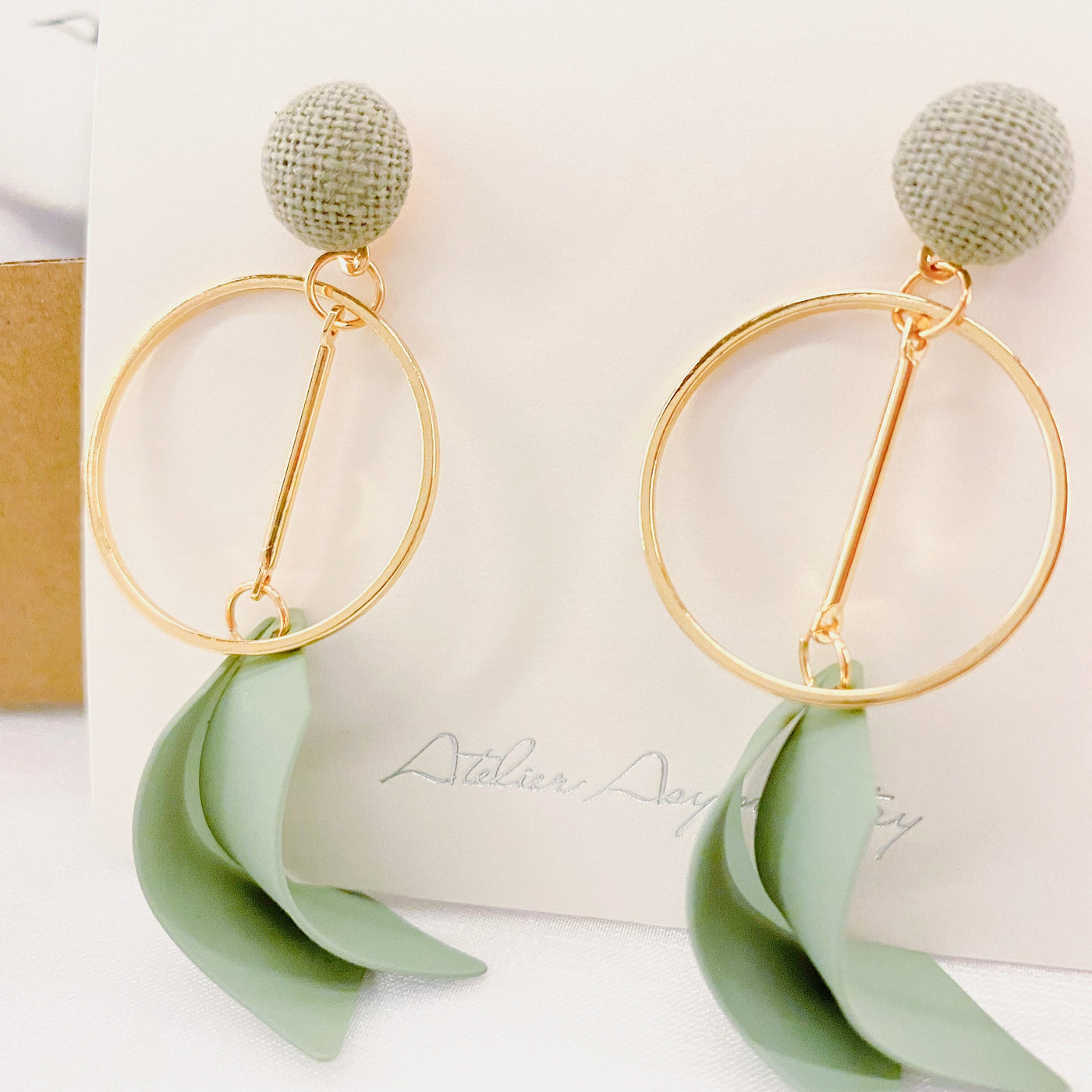 Green Ribbon Dangle Earrings on Box